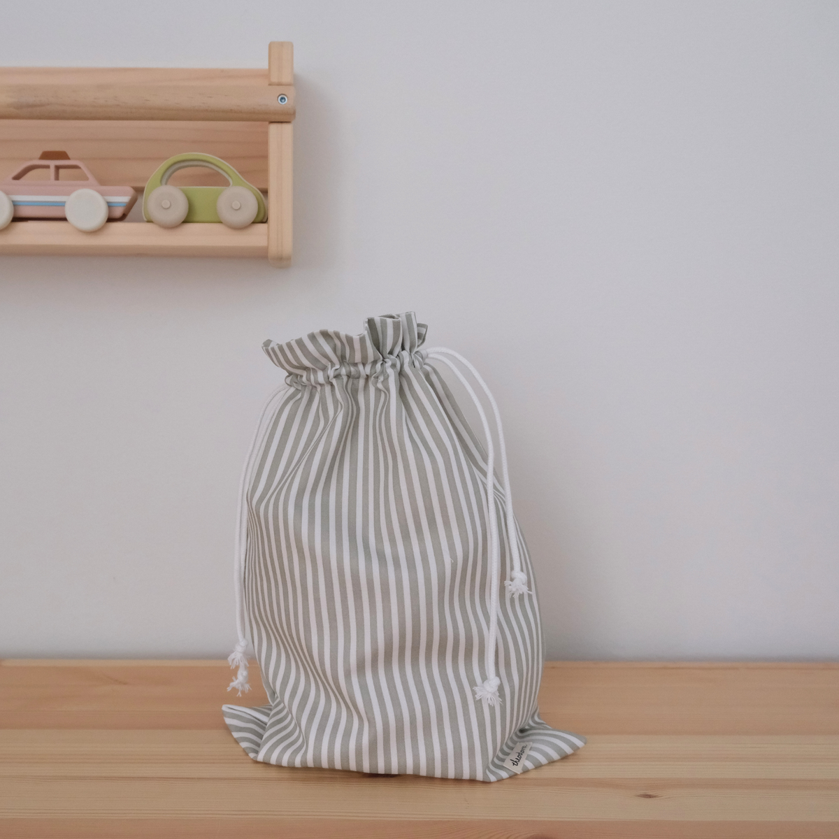 Bolsa impermeable chica rayas verdes