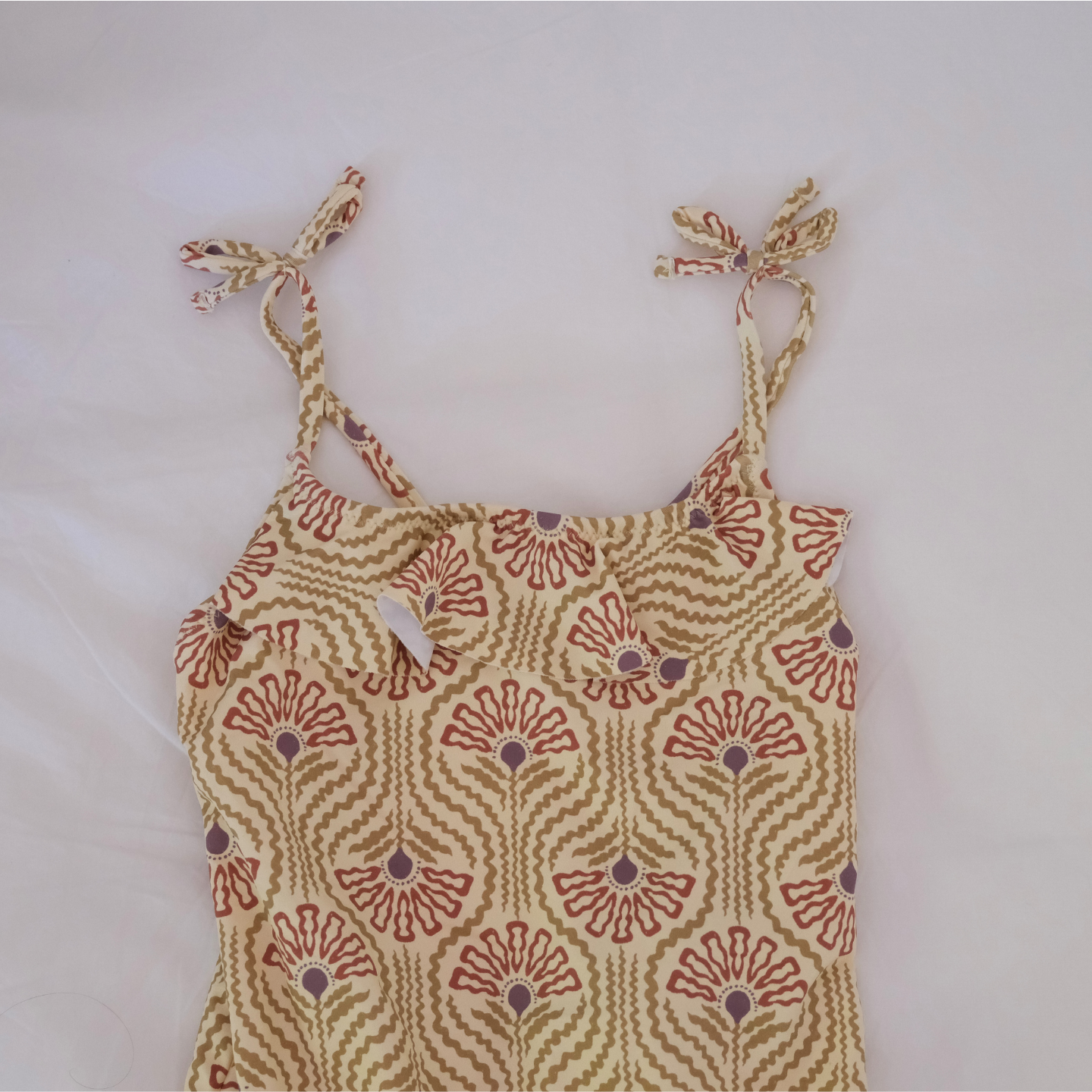 Traje de baño flor marrón