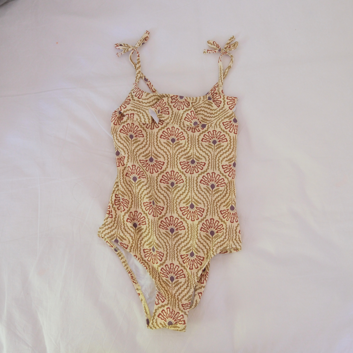 Traje de baño flor marrón
