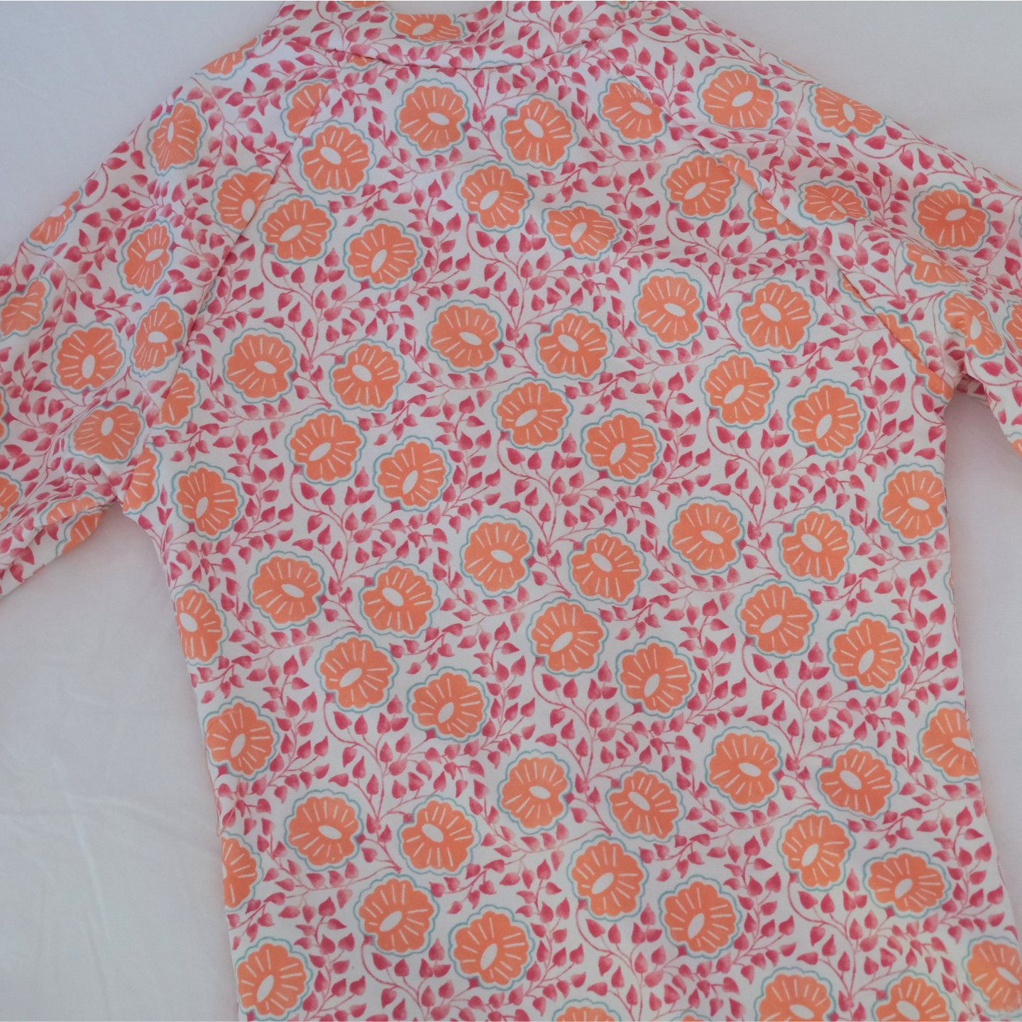 Traje de baño entero flores naranjas