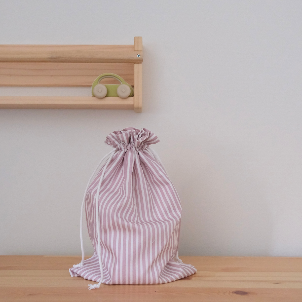 Bolsa impermeable chica rayas rosas