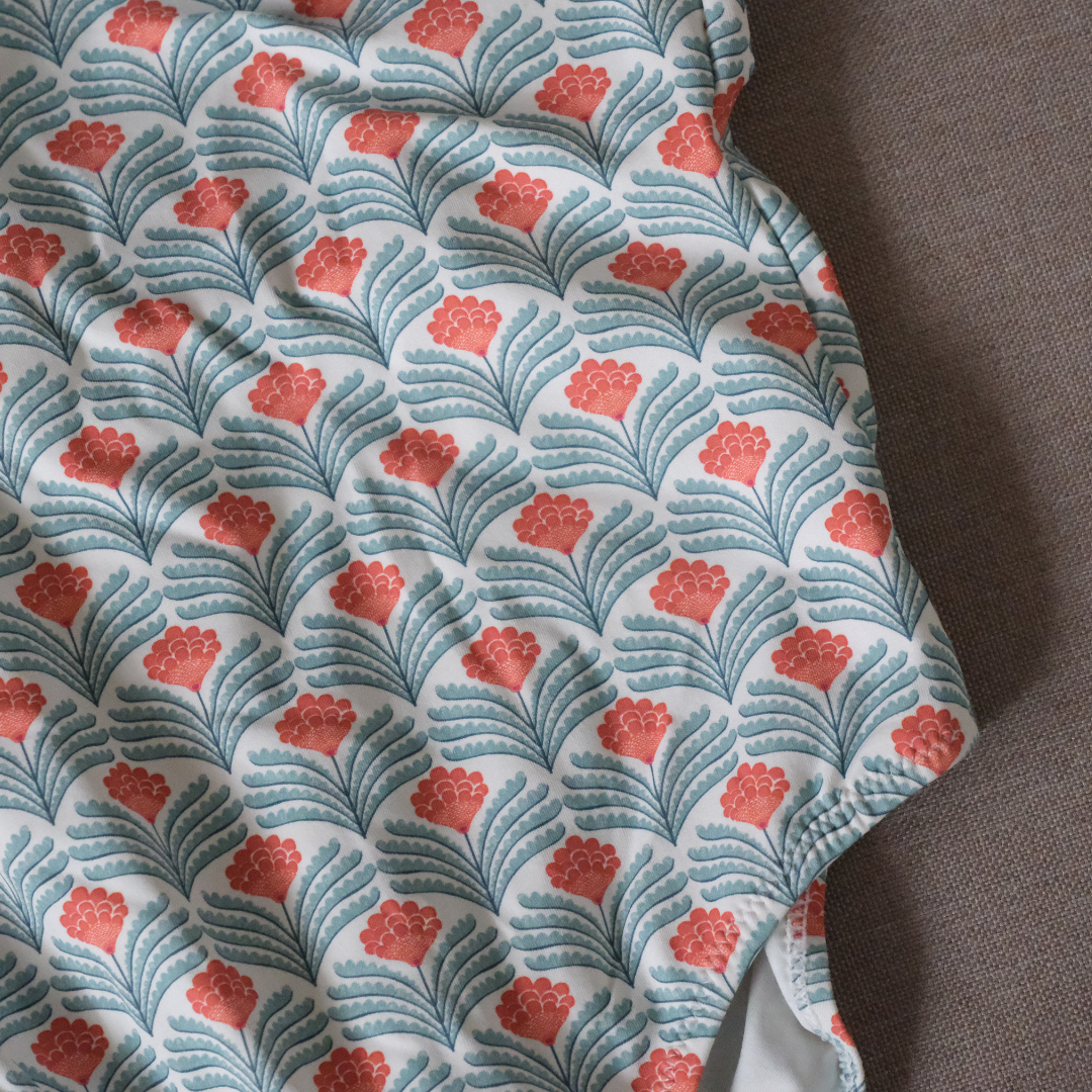 Traje de baño flor naranja