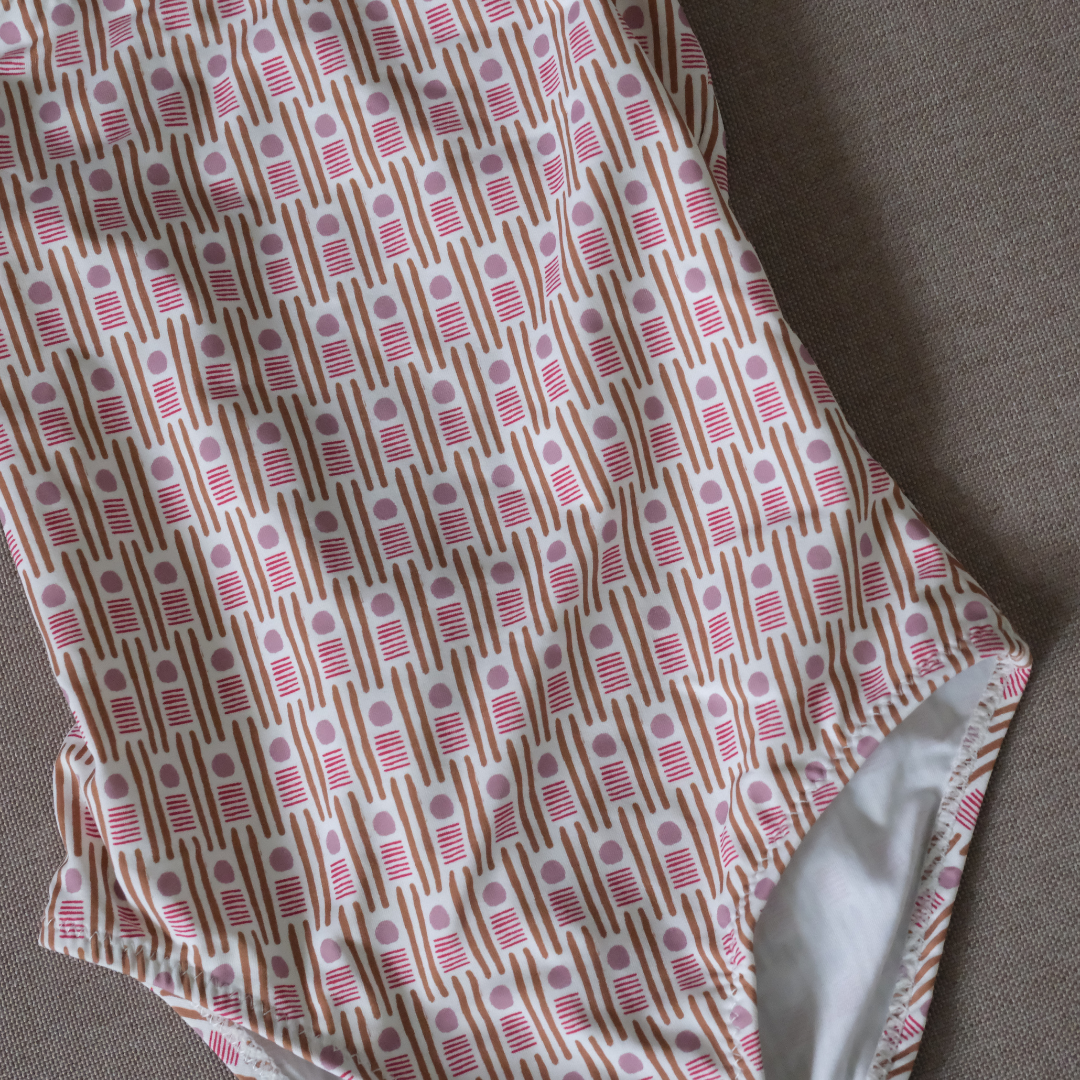 Traje de baño puntos rosas