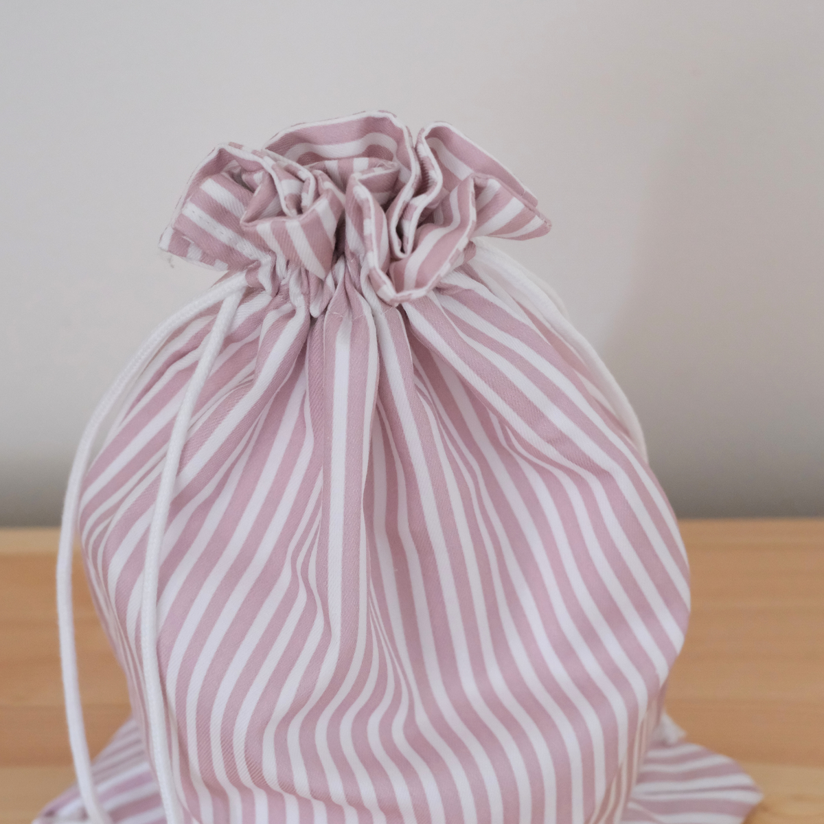 Bolsa impermeable chica rayas rosas