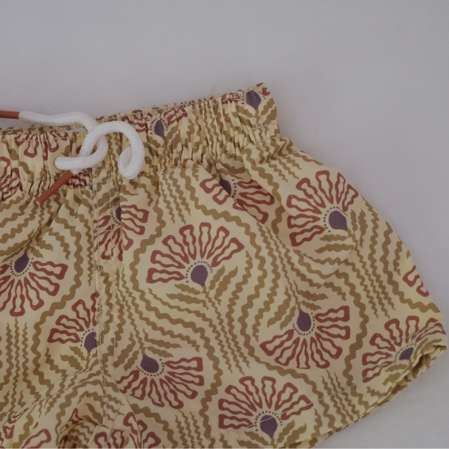 Traje de baño flor marrón